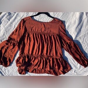 Orange-brown puff sleeve top